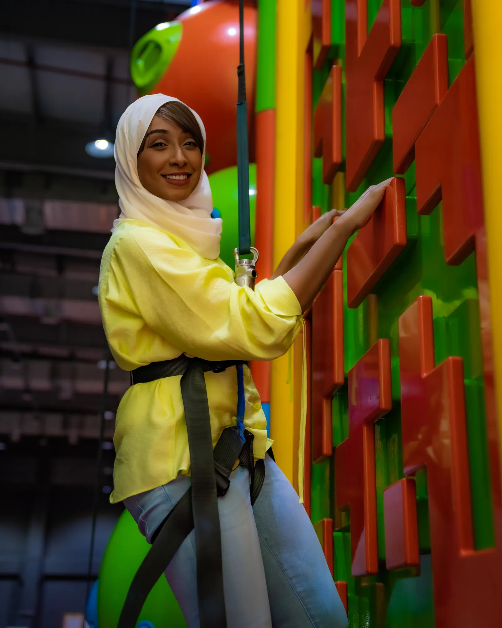 Kids enjoying the climbing walls attraction
