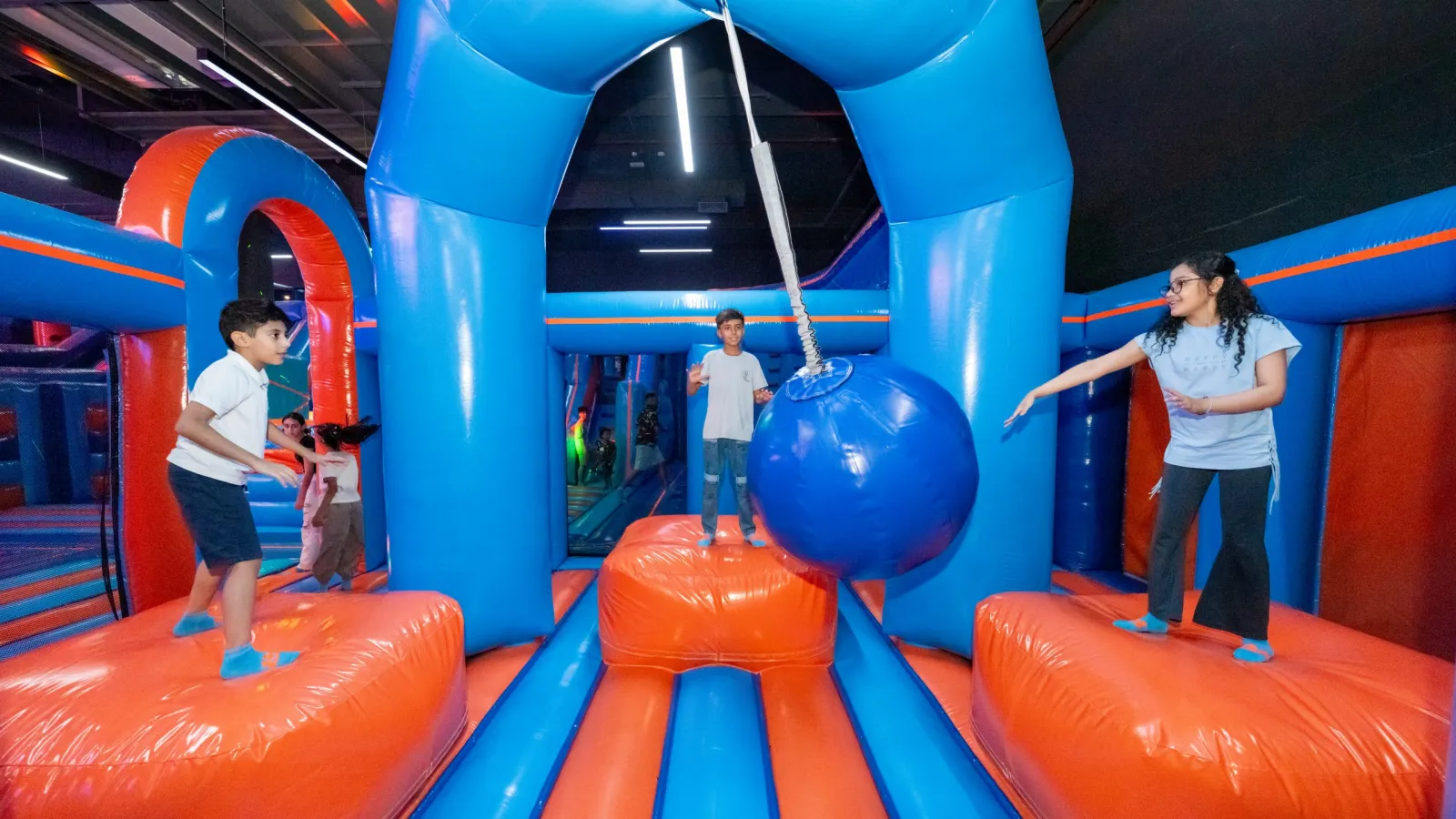 Guests playing inside the inflatable attraction