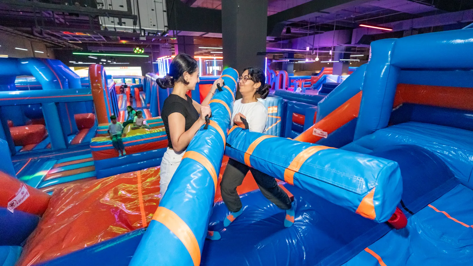 Large inflatable slide at Trampo Oman