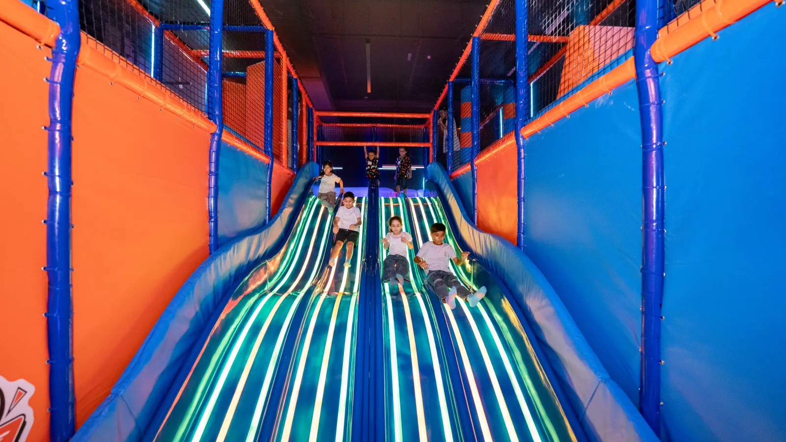 Kids enjoying the slides attraction