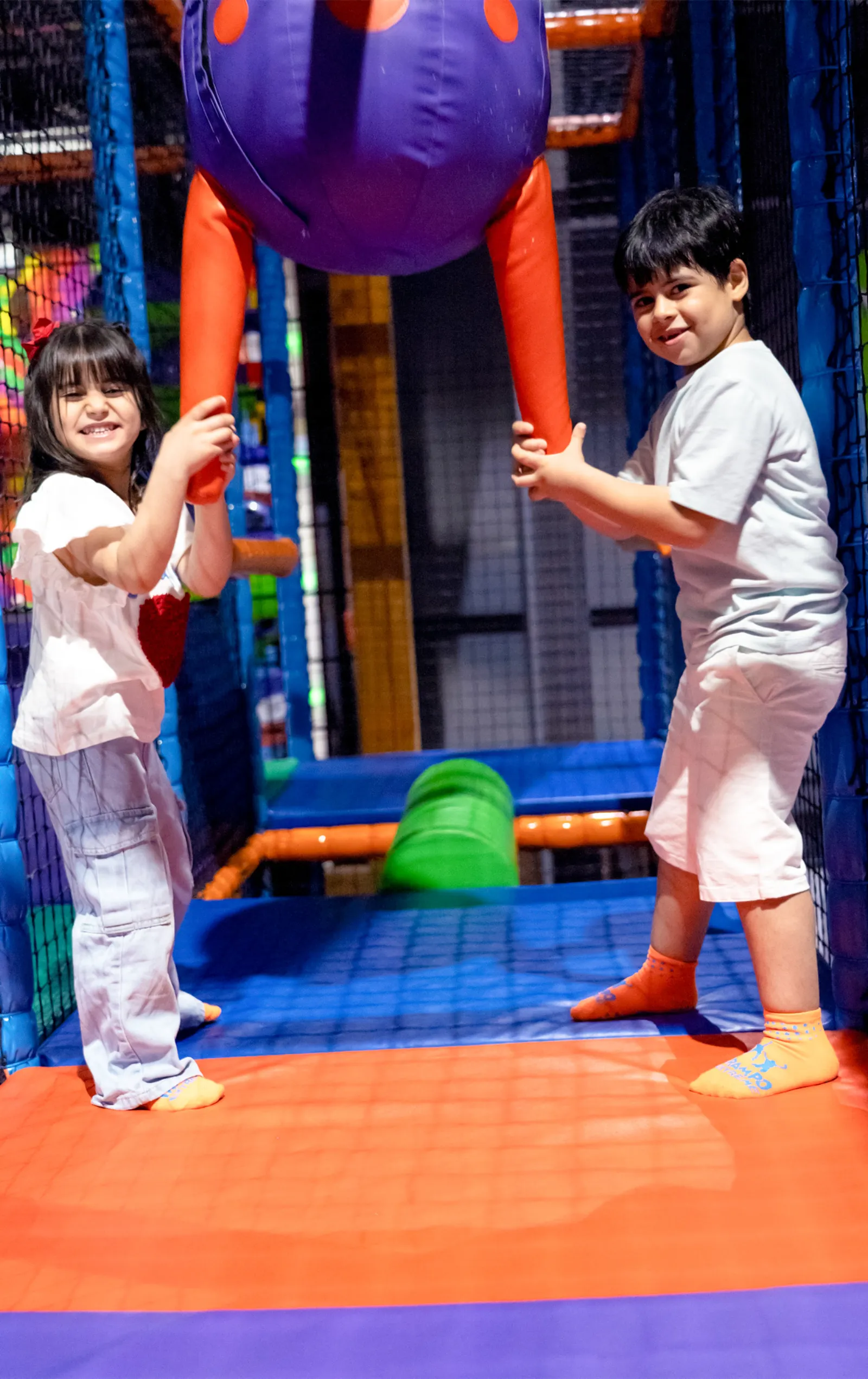 Slides and tunnels inside Soft Play